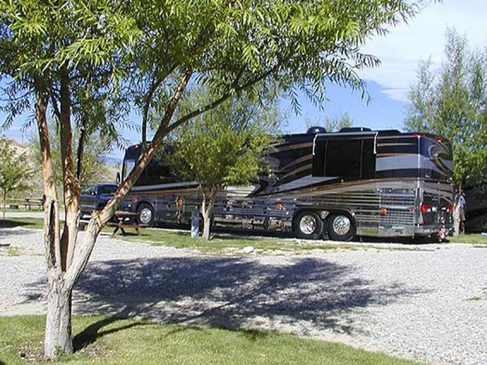 Big rig parked in a site at SLEEPING BEAR RV PARK & CAMPGROUND