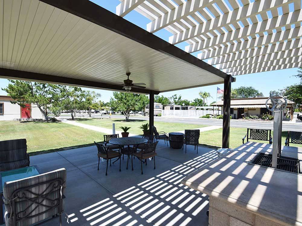 Patio area with picnic table at A COUNTRY RV PARK