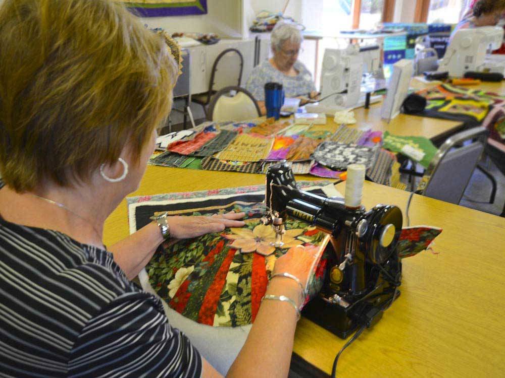 Women sewing at CANYON VISTAS RV RESORT
