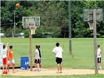 Kids playing basketball at LAKE GASTON AMERICAMPS - thumbnail