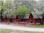 Lodging area with picnic tables at SNAKE RIVER RV PARK AND CAMPGROUND - thumbnail