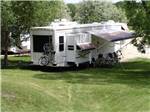 Trailer at campground with bikes at DEER PARK - thumbnail