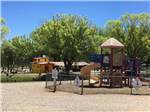 The fenced in playground at OASIS DURANGO RV RESORT - thumbnail