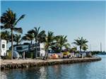 Trailers and tents up against the water at BOYD'S KEY WEST CAMPGROUND - thumbnail