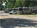 RVs parked in a row at WOLF LODGE CAMPGROUND - thumbnail
