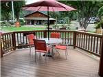 A patio table on a patio at WOLF LODGE CAMPGROUND - thumbnail
