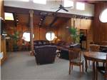 Lodge dining room with cozy seating at SEA PERCH RV RESORT - thumbnail