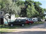 Trailers camping at campsite at HOLIDAY RV PARK & CAMPGROUND - thumbnail