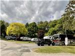 A row of paved RV sites at CAPE ANN CAMP SITE - thumbnail
