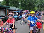 A group of kids getting ready to ride their bikes at STONEBRIDGE RV RESORT - thumbnail