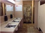 Bathroom and shower area at LOVELAND RV RESORT - thumbnail