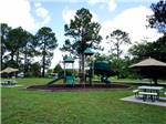 The playground equipment at AMERICAN HERITAGE RV PARK - thumbnail