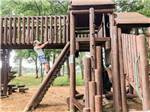 A young boy playing on the playground equipment at SUN OUTDOORS OCEAN CITY GATEWAY - thumbnail