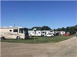 A group of RVs in the grass at WAYNE COUNTY FAIRGROUNDS RV PARK - thumbnail