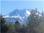 Dramatic view of mountain capped with snow at FRIENDLY RV PARK - thumbnail