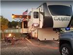 Trailer camping at campsite at BUCKHORN LAKE RESORT - thumbnail