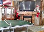 A ping pong table in the rec room at RUTLEDGE LAKE RV RESORT - thumbnail