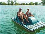 Paddle boat on lake at CABOOSE LAKE CAMPGROUND - thumbnail