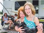 Kids at campsite at CABOOSE LAKE CAMPGROUND - thumbnail