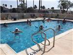 A group of people in the pool at SEVEN OAKS RESORT - thumbnail