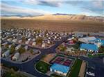Aerial shot of the RV sites and the tennis courts at WINE RIDGE RV RESORT & COTTAGES - thumbnail