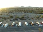 Aerial view over desert with trailers and motorhomes at QUAIL RUN RV PARK - thumbnail