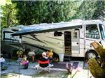 Folks camping with RV at TALL CHIEF CAMPGROUND - thumbnail
