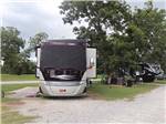 A motorhome parked in an RV site at CECIL BAY RV PARK - thumbnail