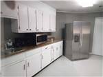 The clean recreation hall kitchen at CECIL BAY RV PARK - thumbnail
