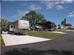 A view of parked RVs in their sites at FISHERMAN'S COVE RESORT - thumbnail