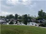 Boats docked on the water at FISHERMAN'S COVE RESORT - thumbnail