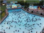 A large group gathering in a pool to watch a movie at NASHVILLE SHORES LAKESIDE RESORT - thumbnail