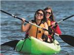 Two women in a kayak at NASHVILLE SHORES LAKESIDE RESORT - thumbnail