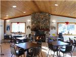 Dining hall with fireplace at THOUSAND TRAILS OAKZANITA SPRINGS - thumbnail