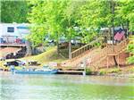 Boat at the dock on the river at THOUSAND TRAILS NATCHEZ TRACE - thumbnail