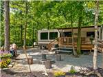 Trailer with picnic table camping at campsite at THOUSAND TRAILS WILMINGTON - thumbnail