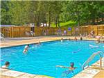 Campers swimming in the pool at THOUSAND TRAILS GREEN MOUNTAIN - thumbnail