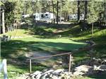 The putting green next to the RV sites at EAGLE CREEK RV RESORT - thumbnail