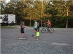 Kids playing on the road at SCENIC MOUNTAIN RV PARK & CAMPGROUND - thumbnail