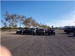 Line up of off road vehicles at DESERT PUEBLO RV RESORT - thumbnail