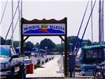 Park sign over marina dock at MONROE BAY CAMPGROUND - thumbnail