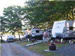 A row of RV sites overlooking the water at HARBOUR LIGHT TRAILER COURT & CAMPGROUND - thumbnail