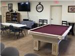 A pool table in the rec room at CRAZY HORSE RV CAMPGROUNDS - thumbnail