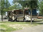 Class A Motorhome parked onsite at BLUE SKY I-35 RV PARK - thumbnail