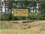 The front entrance sign at WILDERNESS RV PARK - thumbnail