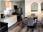The kitchen area inside the rentals at MILL CREEK RV PARK & VACATION RENTALS - thumbnail