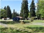 View of trailer and campground buildings at RAINIER WINGS / PACKWOOD RV PARK - thumbnail