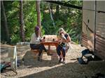 Picnic tables near trees at OUTDOORSY YOSEMITE - thumbnail
