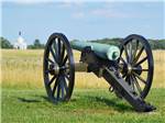 An old cannon in a grassy area at DESTINATION GETTYSBURG - thumbnail
