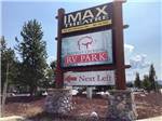 Sign indicating IMAX Theatre and Buffalo Crossing RV Park at BUFFALO CROSSING RV PARK - thumbnail